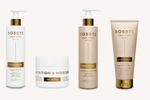 En samling av Bobby's Hair Care-produkter, inklusive en bra hårinpackning, för att ge näring och fukt till håret.