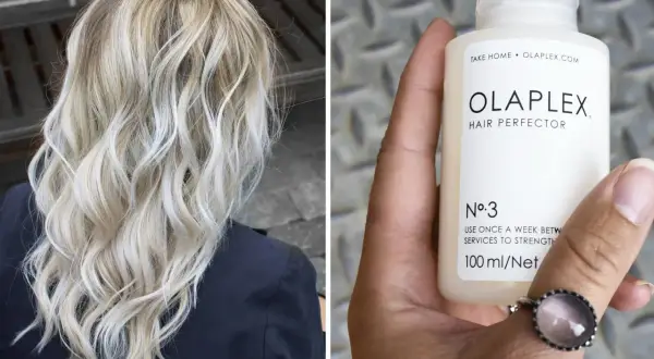 Vacker blont hår som stylats med vågor. En hand håller en flaska Olaplex No. 3, en hårbehandling för styrka.
