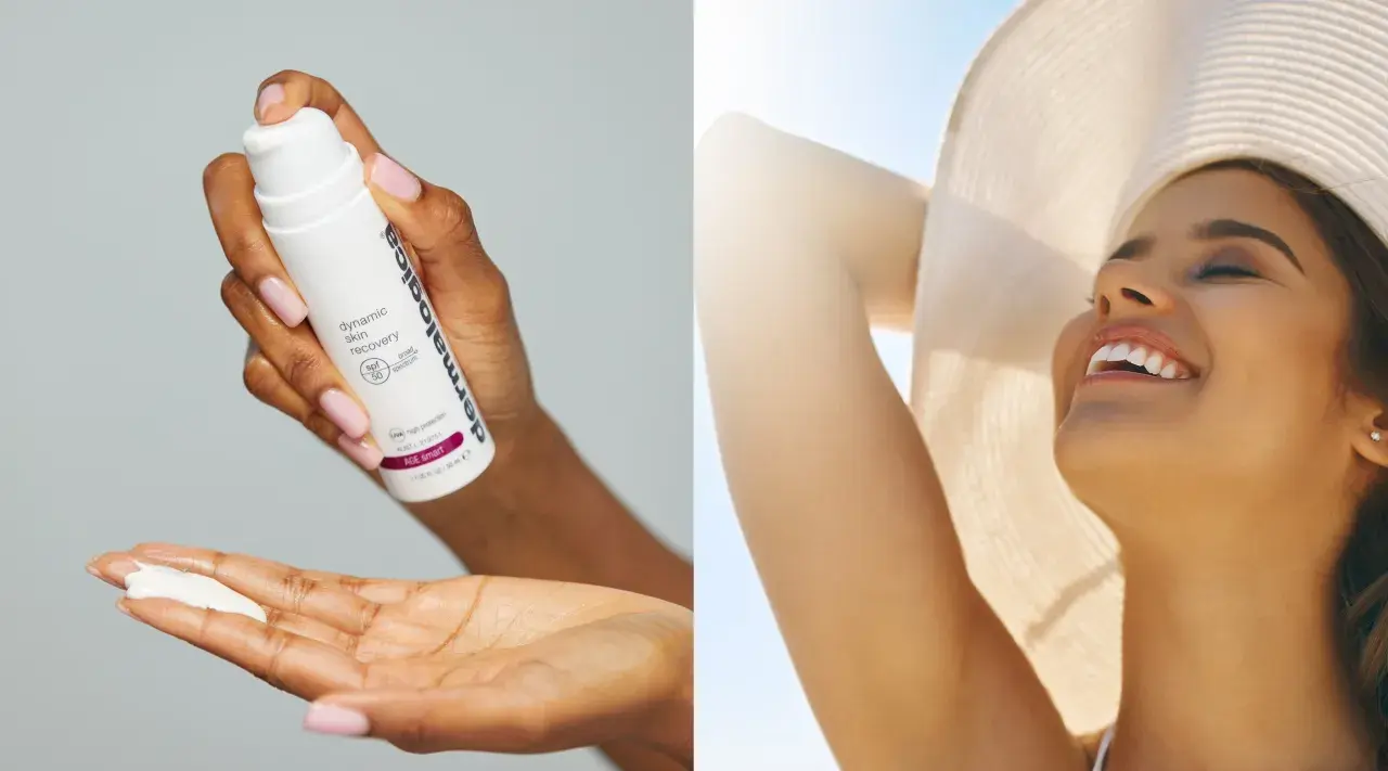 En hand applicerar kräm med SPF 50, bredspektrumskydd mot UVA och UVB, på en annan hand. I bakgrunden ler en kvinna glatt i solljus.