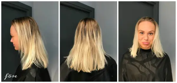 Tunt hår med gardinlugg, blont och lite ostylat. Hon ser lite skeptisk ut.